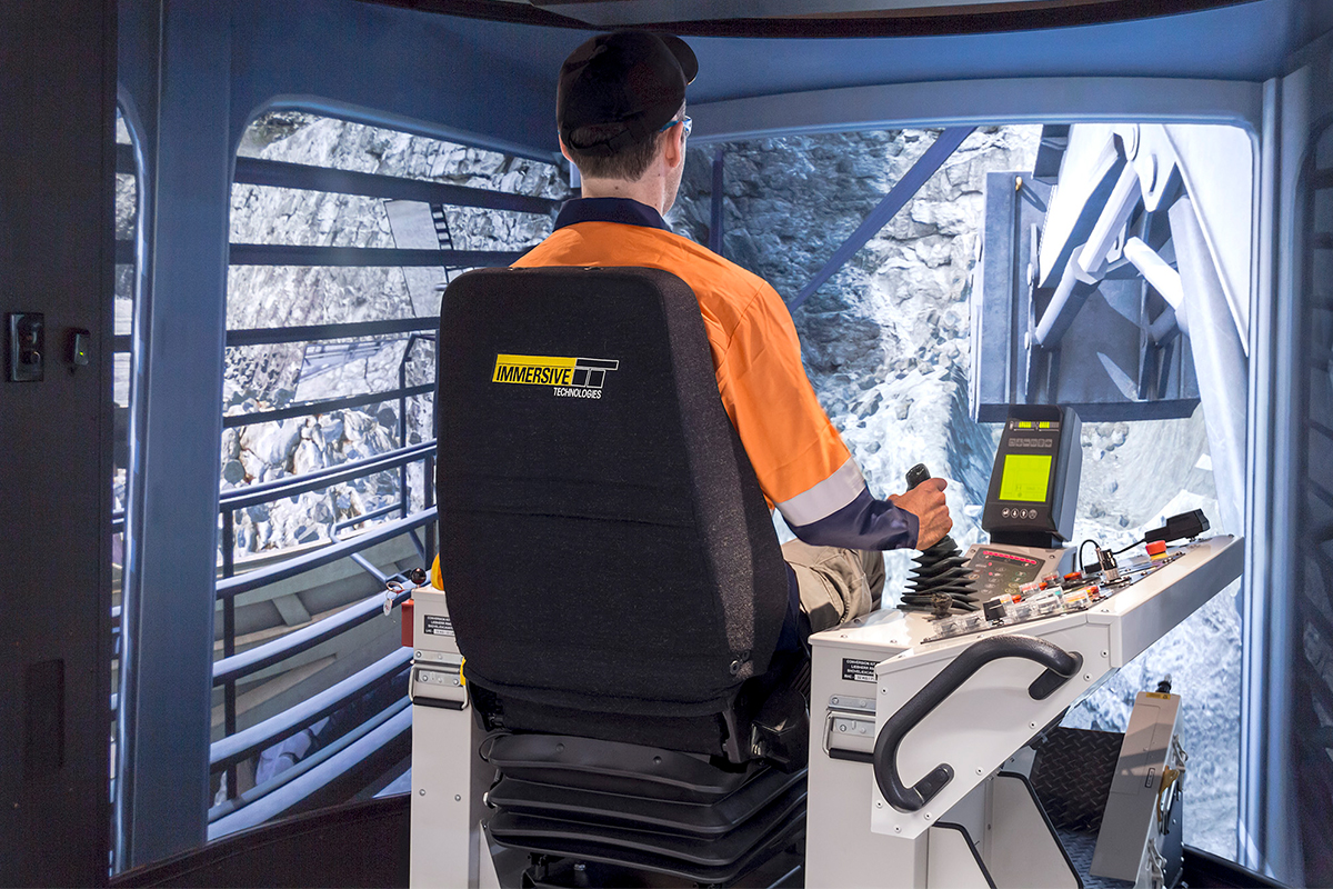 E158 Opérateur sur simulateur de pelle/excavatrice Liebherr R9400